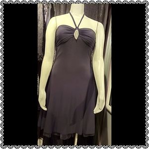 Black cocktail dress with rhinestone accent